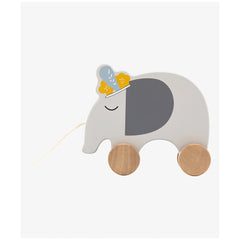 Wooden elephant pull-along toy features a gray body, yellow ear with flower, and brown feet, made from cardboard and wood.